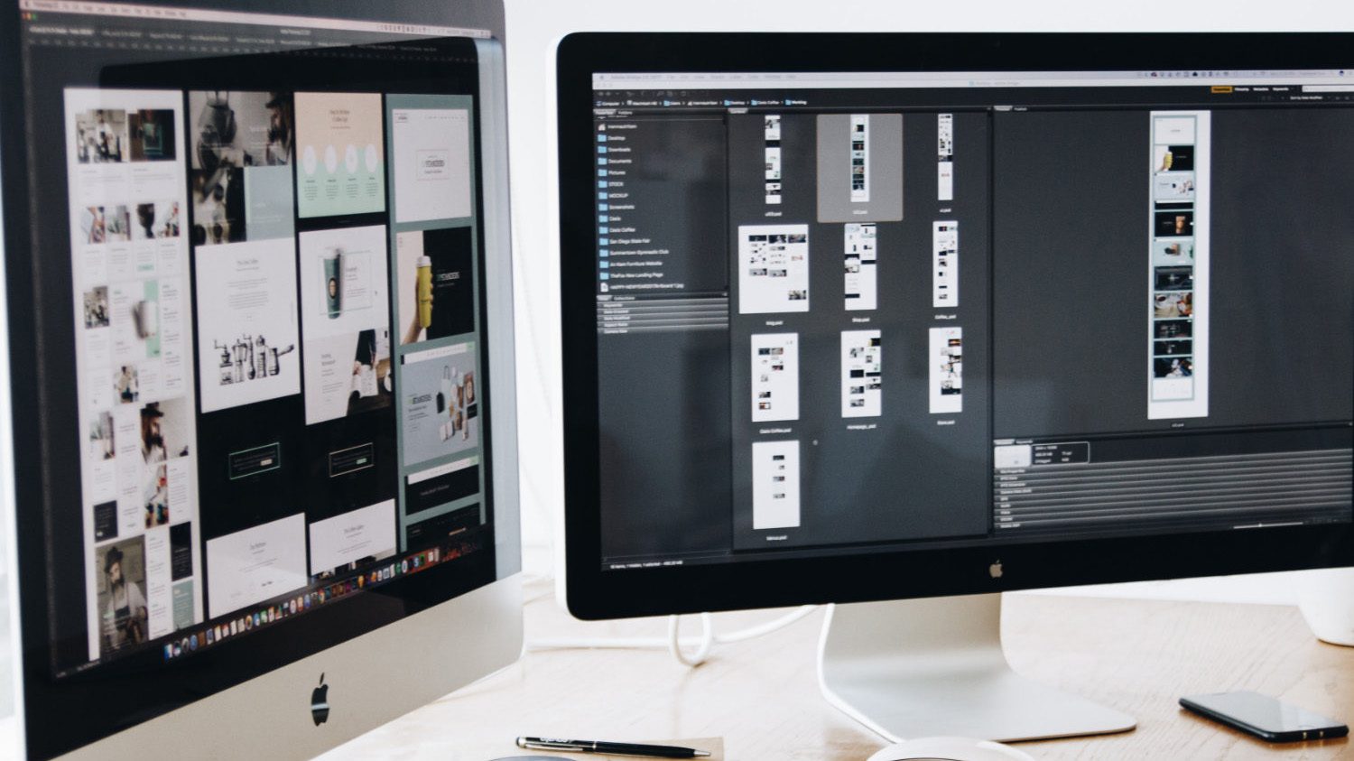 Two iMacs displaying mockups of a website